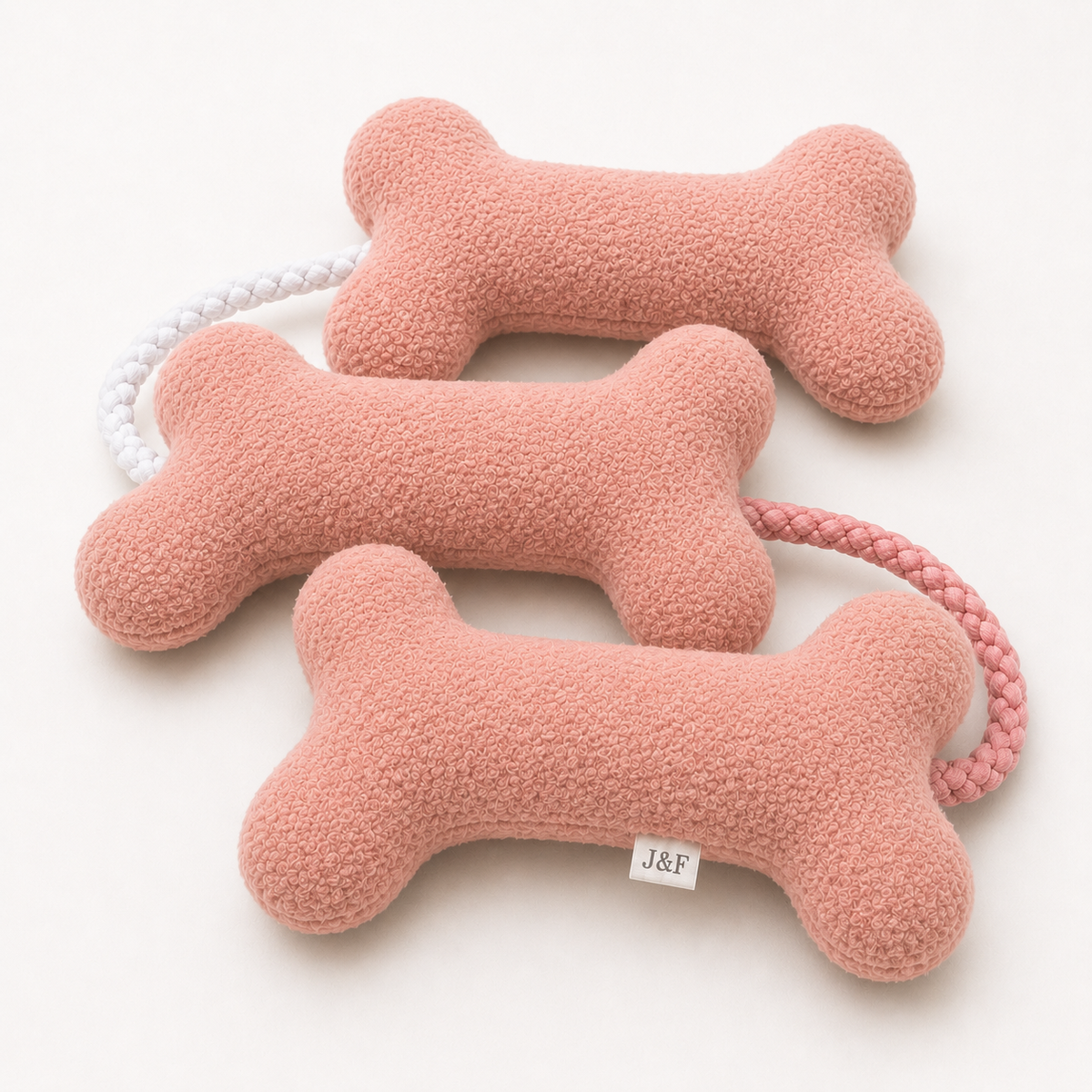 Roze hondenknuffel met zachte schakels van Judith & Florent